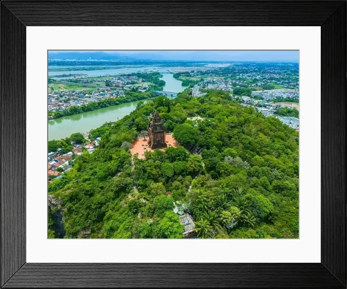 Framed Print : Aerial view of Nhan temple, tower is an artistic architectural work of Champa people in Tuy Hoa city Framed Print : Aerial view of Nhan temple, tower is an artistic architectural work of Champa people in Tuy Hoa city