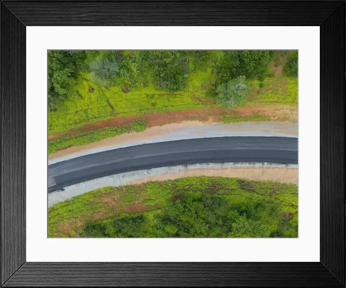 Framed Print : Curve in asphalt road above top drone view Framed Print : Curve in asphalt road above top drone view