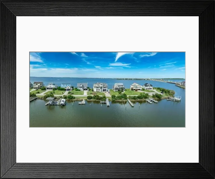 Framed Print : Luxury holiday villa real estate property with boat docks at Pond Island OBX North Carolina Framed Print : Luxury holiday villa real estate property with boat docks at Pond Island OBX North Carolina