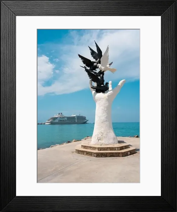 Framed Print : Aydin Kusadasi, Turkey - 4 July 2024: Hand of Peace Sculpture and cruise ship behind it in Kusadasi Aydin