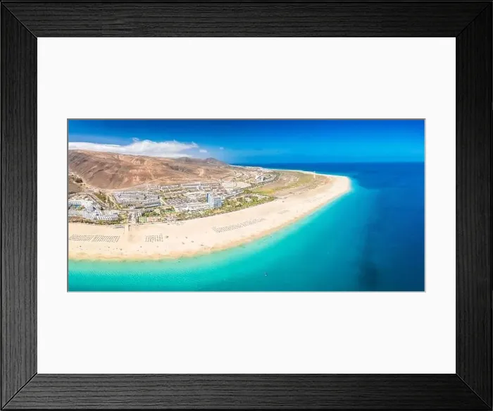 Framed Print : White sandy beach and blue water in Morro Jable, south of Fuerteventura, Canary islands, Spain Framed Print : White sandy beach and blue water in Morro Jable, south of Fuerteventura, Canary islands, Spain