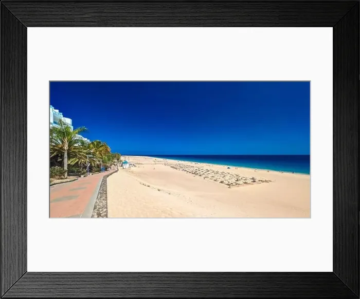 Framed Print : White sandy beach and blue water in Morro Jable, south of Fuerteventura, Canary islands, Spain Framed Print : White sandy beach and blue water in Morro Jable, south of Fuerteventura, Canary islands, Spain
