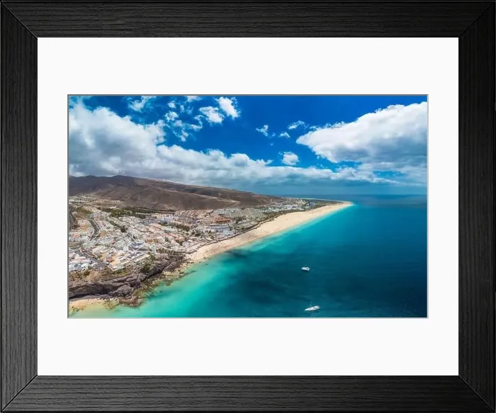 Framed Print : White sandy beach and blue water in Morro Jable, south of Fuerteventura, Canary islands, Spain Framed Print : White sandy beach and blue water in Morro Jable, south of Fuerteventura, Canary islands, Spain