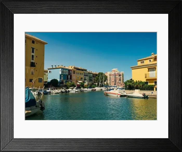 Framed Print : Colorful houses, buildings and yachts in Port Saplaya, Valencia's Little Venice. High quality photo Framed Print : Colorful houses, buildings and yachts in Port Saplaya, Valencia's Little Venice. High quality photo
