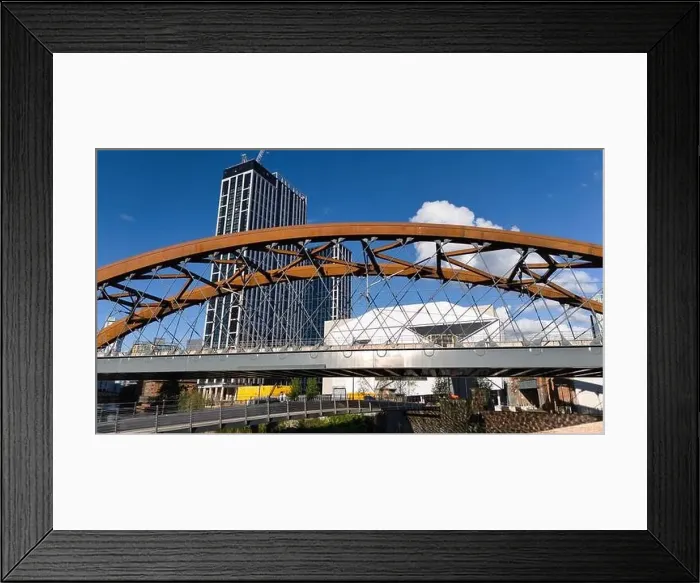 Framed Print : Aerial image of Ordsall Chord rail-bridge and the footbridge in Manchester UK Framed Print : Aerial image of Ordsall Chord rail-bridge and the footbridge in Manchester UK