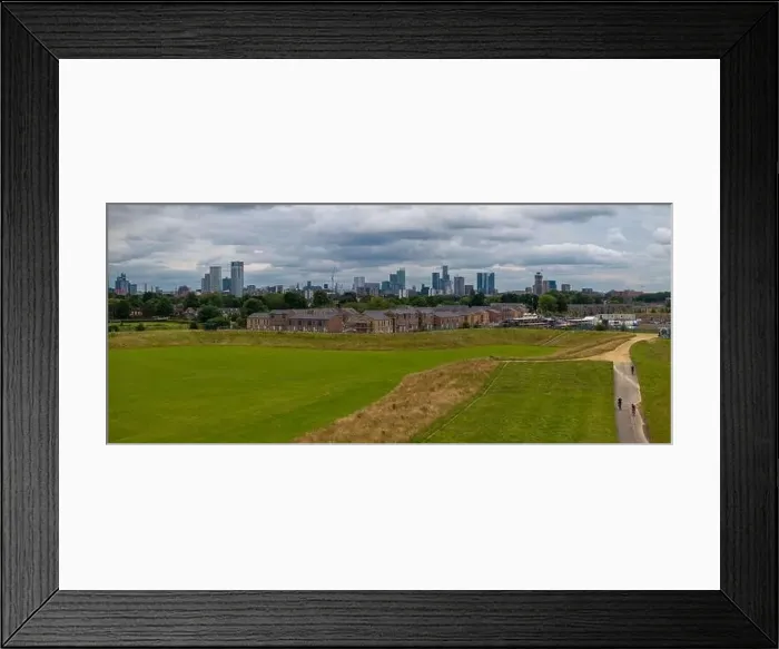 Framed Print : Aerial view of Manchester cityscape with skyscrapers and construction sites Framed Print : Aerial view of Manchester cityscape with skyscrapers and construction sites