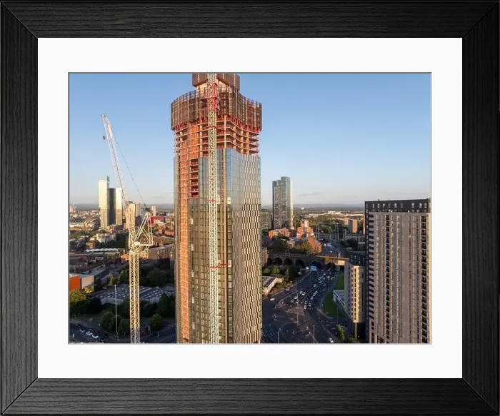 Framed Print : Aerial image of Trinity Islands skyscraper cluster in Manchester UK and Manchester skyline on the background Framed Print : Aerial image of Trinity Islands skyscraper cluster in Manchester UK and Manchester skyline on the background