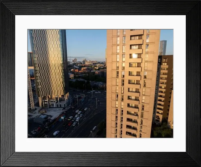 Framed Print : Aerial image of Trinity Islands skyscraper cluster in Manchester UK and Manchester skyline on the background Framed Print : Aerial image of Trinity Islands skyscraper cluster in Manchester UK and Manchester skyline on the background