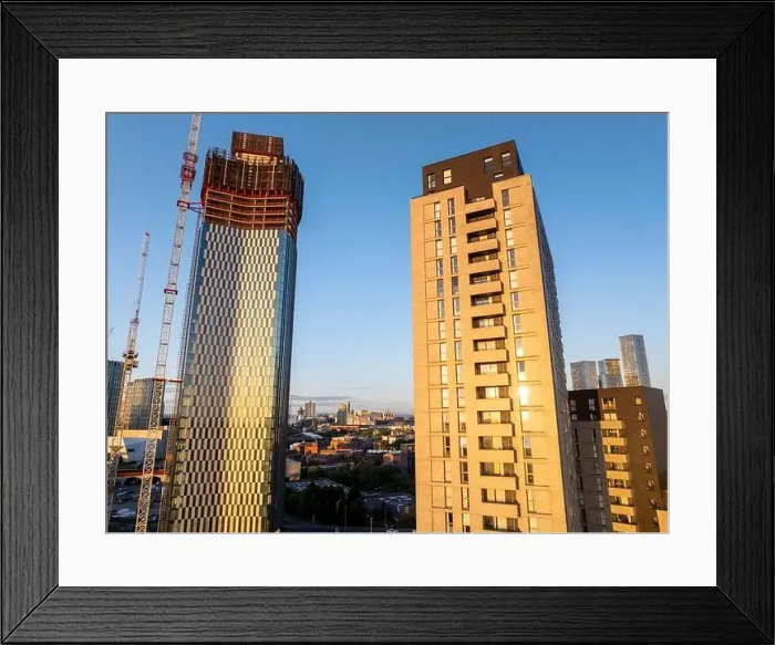 Framed Print : Aerial image of Trinity Islands skyscraper cluster in Manchester UK and Manchester skyline on the background Framed Print : Aerial image of Trinity Islands skyscraper cluster in Manchester UK and Manchester skyline on the background