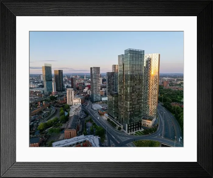 Framed Print : Aerial view of modern skyscrapers in Manchester at dusk Framed Print : Aerial view of modern skyscrapers in Manchester at dusk