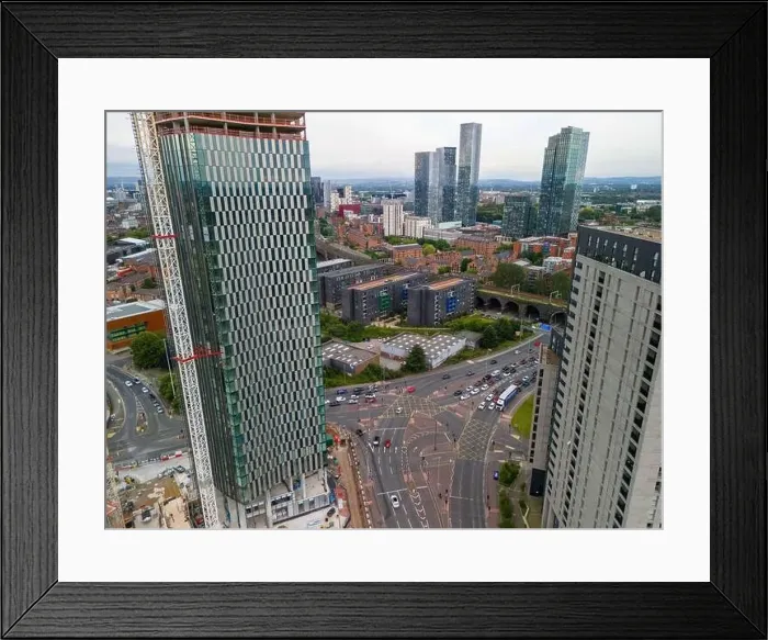 Framed Print : Aerial image of Trinity Islands skyscraper cluster in Manchester UK and Manchester skyline on the background