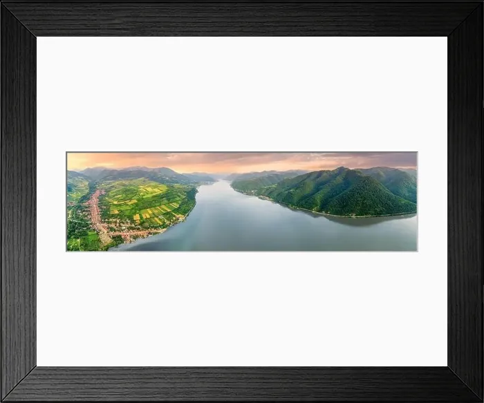 Framed Print : Aerial panorama of the Danube River's coast near Liubcova, Romania, and Djerdap, Serbia, in summer