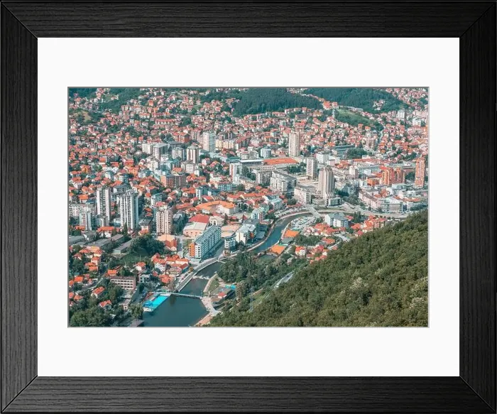 Framed Print : Beautiful city view of Uzice city, Serbia from above, highlighting the European architecture and the vibrant landscape Framed Print : Beautiful city view of Uzice city, Serbia from above, highlighting the European architecture and the vibrant landscape