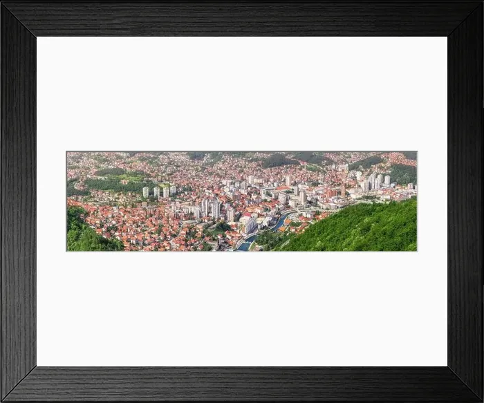 Framed Print : Beautiful city view of Uzice city, Serbia from above, highlighting the European architecture and the vibrant landscape Framed Print : Beautiful city view of Uzice city, Serbia from above, highlighting the European architecture and the vibrant landscape