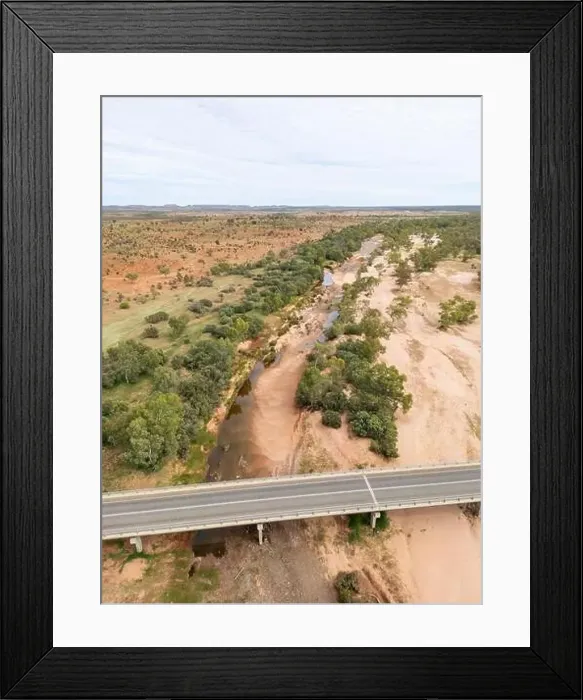 Framed Print : Highway passes over an almost dry river bed in remote Northern Territory Framed Print : Highway passes over an almost dry river bed in remote Northern Territory
