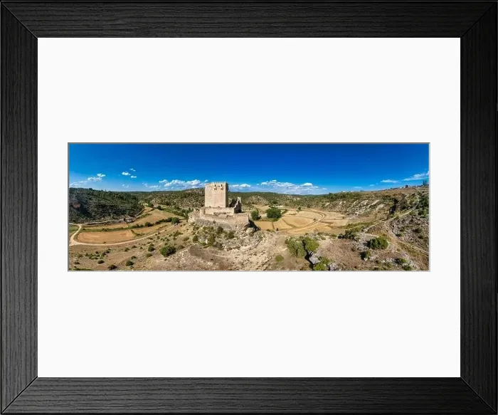 Framed Print : Aerial view of Paracuellos de la Vega Spanish medieval castle perched on a rock in Cuenca