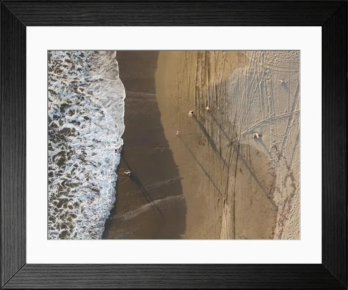 Framed Print : Family play at ocean beach at sunset golden time above top drone view Framed Print : Family play at ocean beach at sunset golden time above top drone view