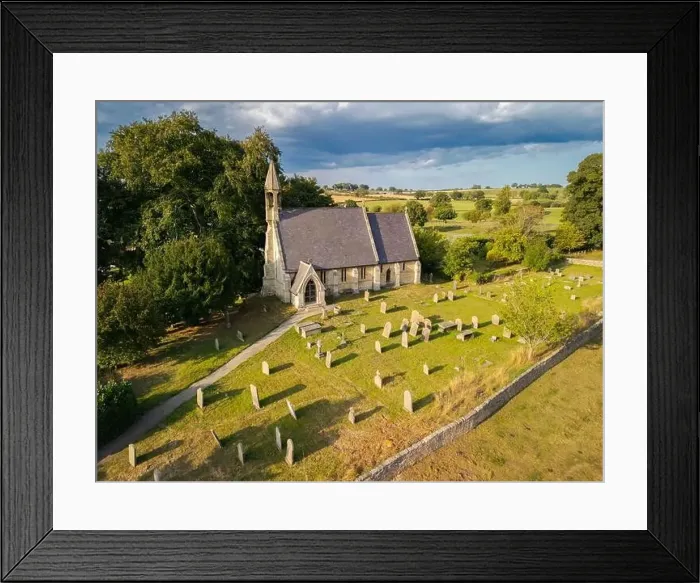 Framed Print : Aerial View of St. Wilfrid's Church in South Stainley, North Yorkshire, Under Dramatic Skies Framed Print : Aerial View of St. Wilfrid's Church in South Stainley, North Yorkshire, Under Dramatic Skies