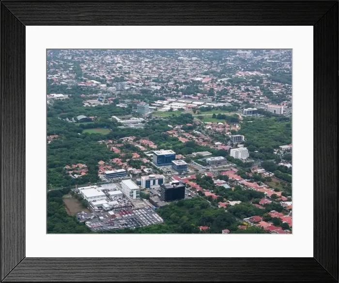 Framed Print : Managua, Nicaragua - August 14, 2024: Office building in Managua city aerial drone view Framed Print : Managua, Nicaragua - August 14, 2024: Office building in Managua city aerial drone view