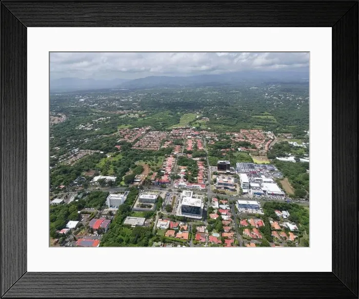 Framed Print : Managua, Nicaragua - August 16, 2024: Business district in Managua city aerial drone view Framed Print : Managua, Nicaragua - August 16, 2024: Business district in Managua city aerial drone view