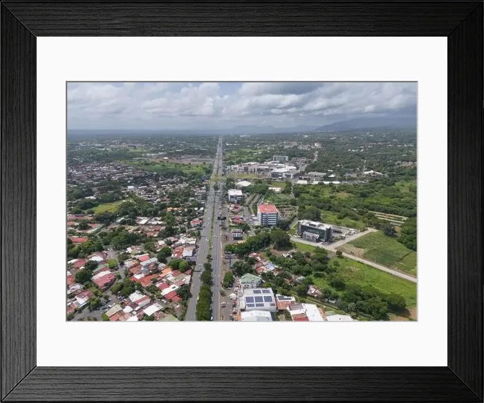 Framed Print : Managua, Nicaragua - August 16, 2024: Wide cityscape of Managua town aerial drone view Framed Print : Managua, Nicaragua - August 16, 2024: Wide cityscape of Managua town aerial drone view