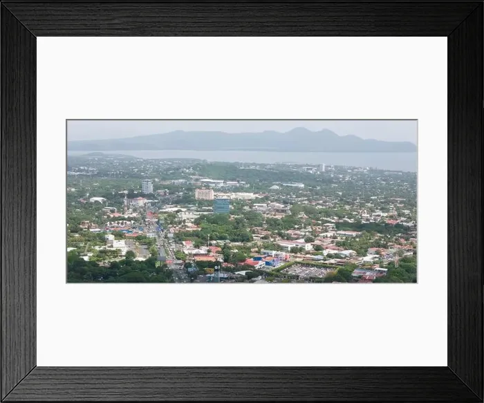 Framed Print : Managua, Nicaragua - August 16, 2024: Business center of Managua city aerial drone view Framed Print : Managua, Nicaragua - August 16, 2024: Business center of Managua city aerial drone view