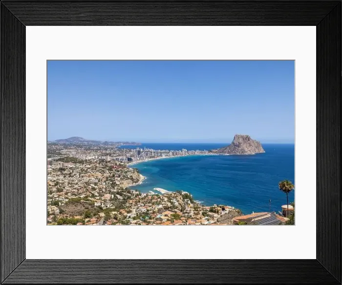 Framed Print : Aerial drone photo of the beautiful coastal town of Calp on Spain's Mediterranean coast showing an aerial drone view of Framed Print : Aerial drone photo of the beautiful coastal town of Calp on Spain's Mediterranean coast showing an aerial drone view of