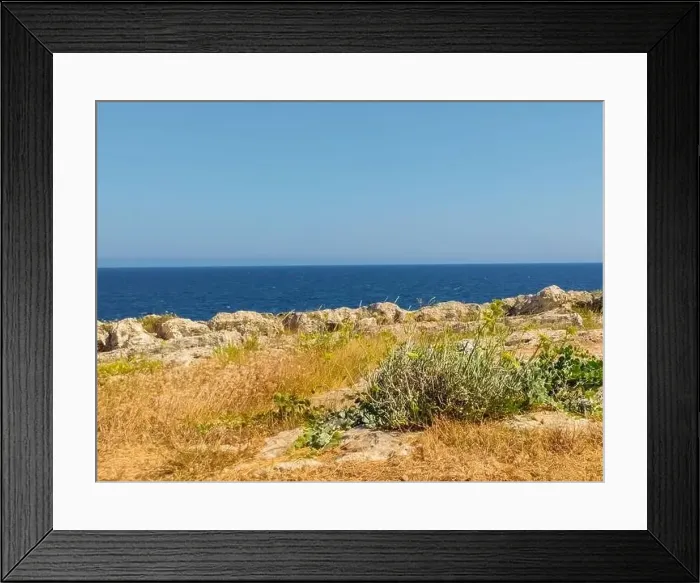 Framed Print : Sea seen from a wild and uninhabited coast Framed Print : Sea seen from a wild and uninhabited coast