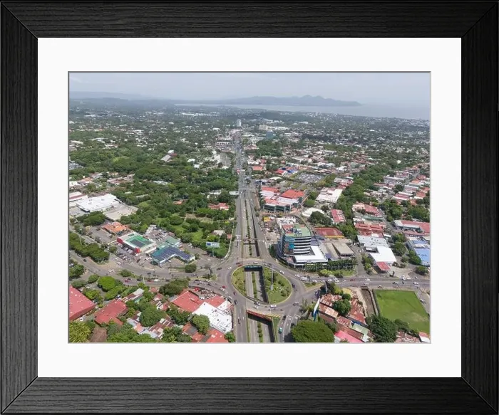 Framed Print : Managua, Nicaragua - August 16, 2024: Main Masaya road in Managua city aerial drone view Framed Print : Managua, Nicaragua - August 16, 2024: Main Masaya road in Managua city aerial drone view