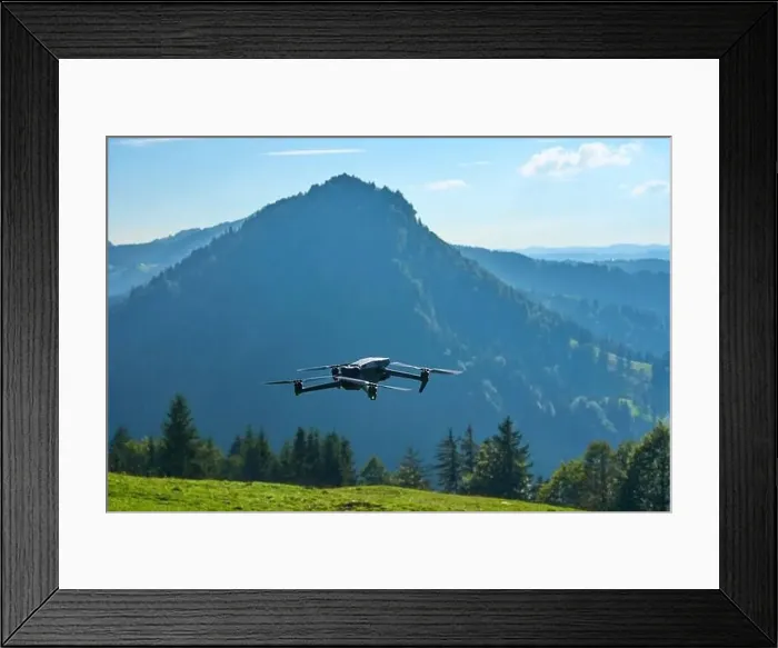 Framed Print : flying drone in the Allgaeu mountains taking pictures and movies Framed Print : flying drone in the Allgaeu mountains taking pictures and movies