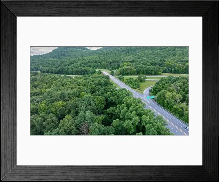Framed Print : August 20 2024, Sunny afternoon summer aerial image of the interstate, I 87 north of Lake George, NY, USA Framed Print : August 20 2024, Sunny afternoon summer aerial image of the interstate, I 87 north of Lake George, NY, USA