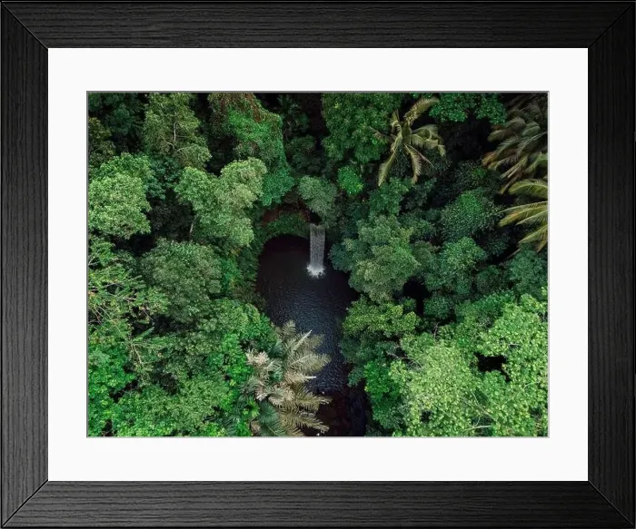 Framed Print : Waterfall in tropical rain forest on Bali island. Aerial drone view Framed Print : Waterfall in tropical rain forest on Bali island. Aerial drone view