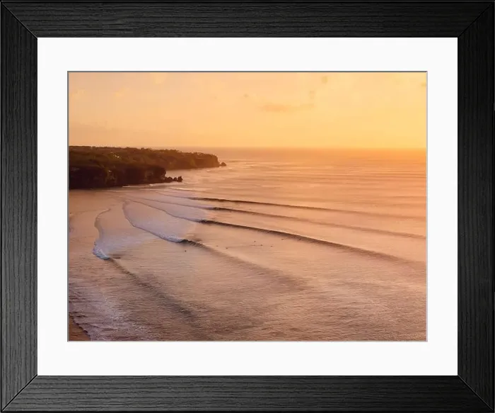 Framed Print : Aerial view of warm sunset or sunrise and ocean with perfect long waves in Bali Framed Print : Aerial view of warm sunset or sunrise and ocean with perfect long waves in Bali