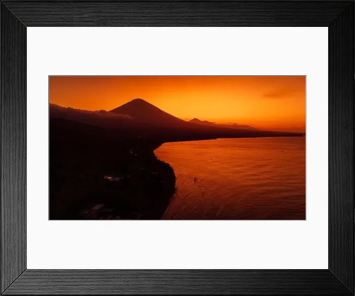 Framed Print : Panoramic drone view of coastline with volcano and sunset with quiet ocean in Bali Framed Print : Panoramic drone view of coastline with volcano and sunset with quiet ocean in Bali