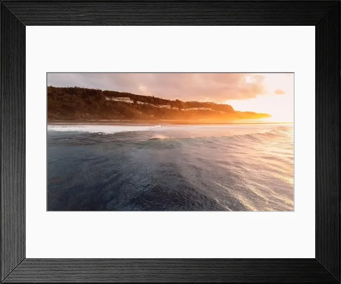 Framed Print : Bali coastline, ocean on low tide and waves with sunrise sunlight. Panoramic drone view Framed Print : Bali coastline, ocean on low tide and waves with sunrise sunlight. Panoramic drone view