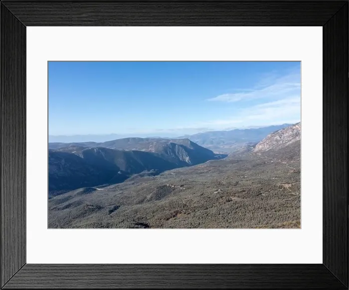 Framed Print : Mountain landscape, fir ttrees forest and blue sky. Parnassos mountain aerial drone view. Greece, Boeotia Framed Print : Mountain landscape, fir ttrees forest and blue sky. Parnassos mountain aerial drone view. Greece, Boeotia