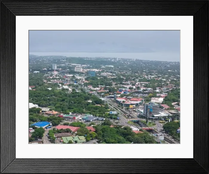 Framed Print : Managua, Nicaragua - August 16, 2024: Panorama view on Managua city aerial drone view in central america Framed Print : Managua, Nicaragua - August 16, 2024: Panorama view on Managua city aerial drone view in central america