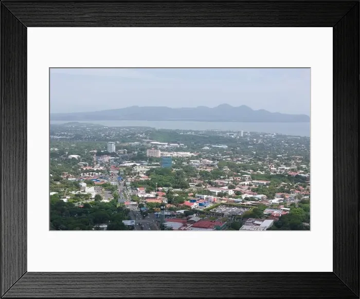 Framed Print : Managua, Nicaragua - August 16, 2024: Masaya highway road in Managua aerial drone view Framed Print : Managua, Nicaragua - August 16, 2024: Masaya highway road in Managua aerial drone view