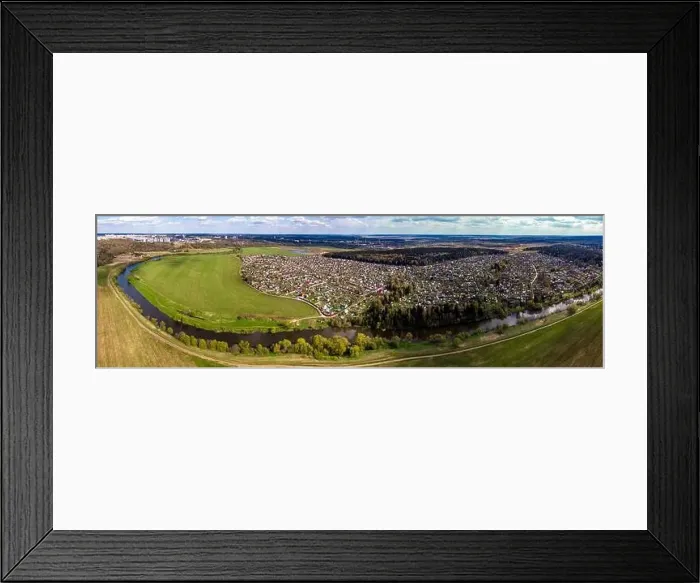Framed Print : Panoramic aerial view of dense dacha development in river valley, countryside from drone Framed Print : Panoramic aerial view of dense dacha development in river valley, countryside from drone