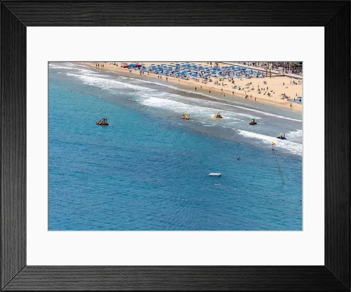 Framed Print : Photo of the city of Benidorm in Spain in the summer time showing people on the famous Levante Beach Framed Print : Photo of the city of Benidorm in Spain in the summer time showing people on the famous Levante Beach