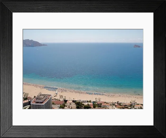 Framed Print : Aerial drone photo of the beautiful city of Benidorm in Spain showing the south beach Promenade and the hotels