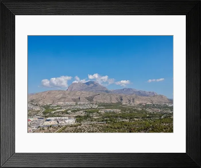 Framed Print : Aerial drone photo of the beautiful city of Benidorm in Spain showing the south side of the city with the high Framed Print : Aerial drone photo of the beautiful city of Benidorm in Spain showing the south side of the city with the high