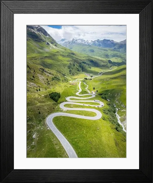 Framed Print : The stunning hairpin bend section of the Julier Pass in Switzerland from a drone Framed Print : The stunning hairpin bend section of the Julier Pass in Switzerland from a drone