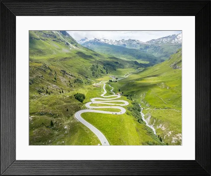 Framed Print : The stunning hairpin bend section of the Julier Pass in Switzerland from a drone Framed Print : The stunning hairpin bend section of the Julier Pass in Switzerland from a drone