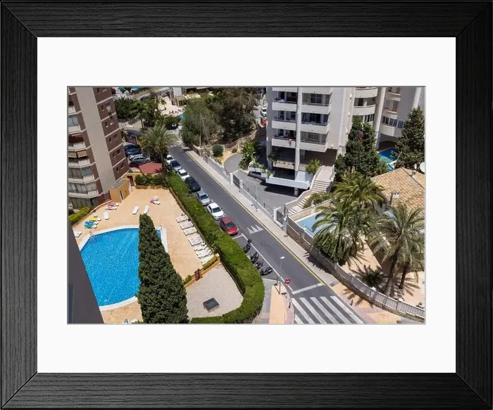 Framed Print : Aerial drone photo of the city of Benidorm in Spain showing a typical view from a hotel balcony with views of a Framed Print : Aerial drone photo of the city of Benidorm in Spain showing a typical view from a hotel balcony with views of a