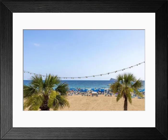 Framed Print : Photo of the famous Levante Beach in Benidorm Spain showing people having fun on the Spanish beach on a hot sunny day Framed Print : Photo of the famous Levante Beach in Benidorm Spain showing people having fun on the Spanish beach on a hot sunny day