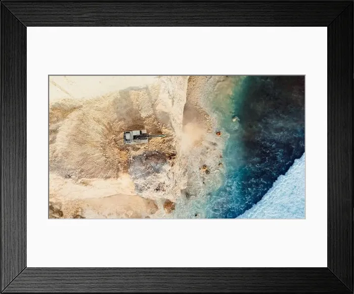 Framed Print : The work of escalators and the destroying of the cliff in Uluwatu, Bali. Aerial view, top down Framed Print : The work of escalators and the destroying of the cliff in Uluwatu, Bali. Aerial view, top down