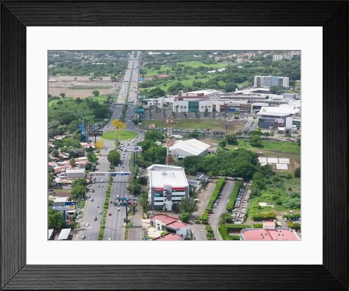 Framed Print : Managua, Nicaragua - August 16, 2024: Shopping district in Managua aerial drone view Framed Print : Managua, Nicaragua - August 16, 2024: Shopping district in Managua aerial drone view