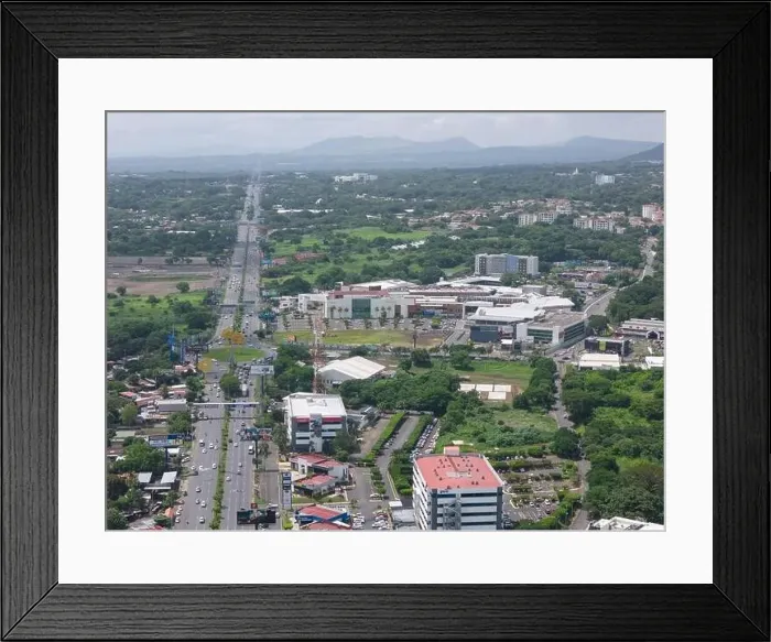 Framed Print : Managua, Nicaragua - August 16, 2024: Highway road to Masaya in Managua aerial drone view Framed Print : Managua, Nicaragua - August 16, 2024: Highway road to Masaya in Managua aerial drone view