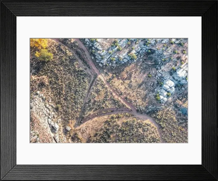 Framed Print : Aerial view on the landscape around the Arches National Park with a triangle shaped path, Utah Framed Print : Aerial view on the landscape around the Arches National Park with a triangle shaped path, Utah
